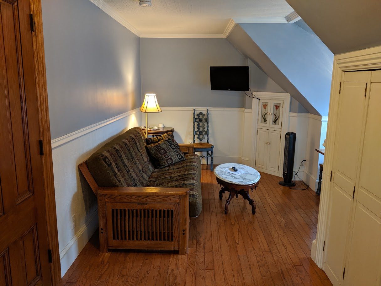 Futon living area in the 3rd floor suite